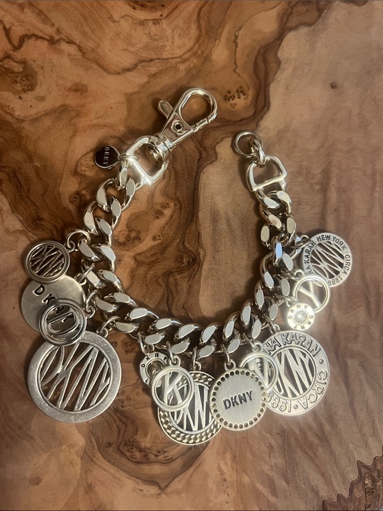Dkny Jewelry - DKNY Gold-Tone Charm Bracelet with Multiple Logo Discs
